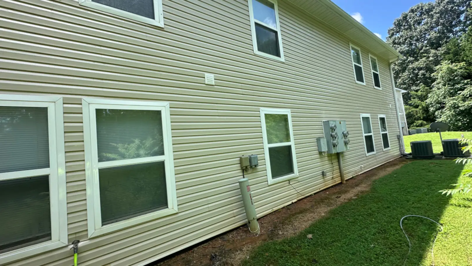 Clean commercial building exterior after pressure washing