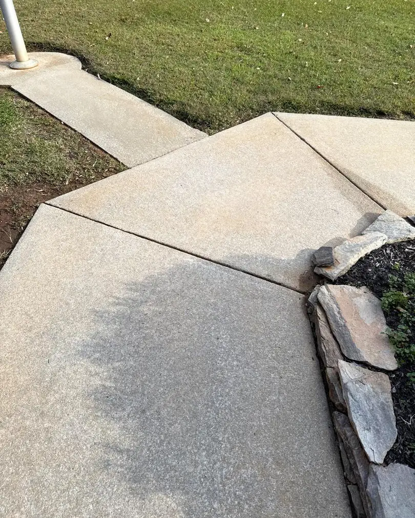 Clean commercial sidewalk after pressure washing